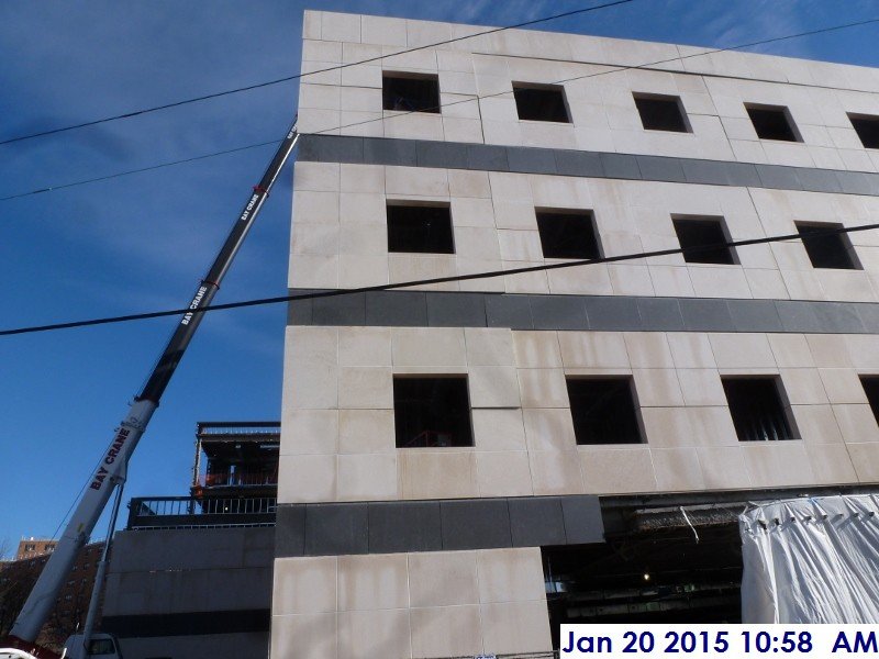 Erecting stone panels at the West Elevation Facing East